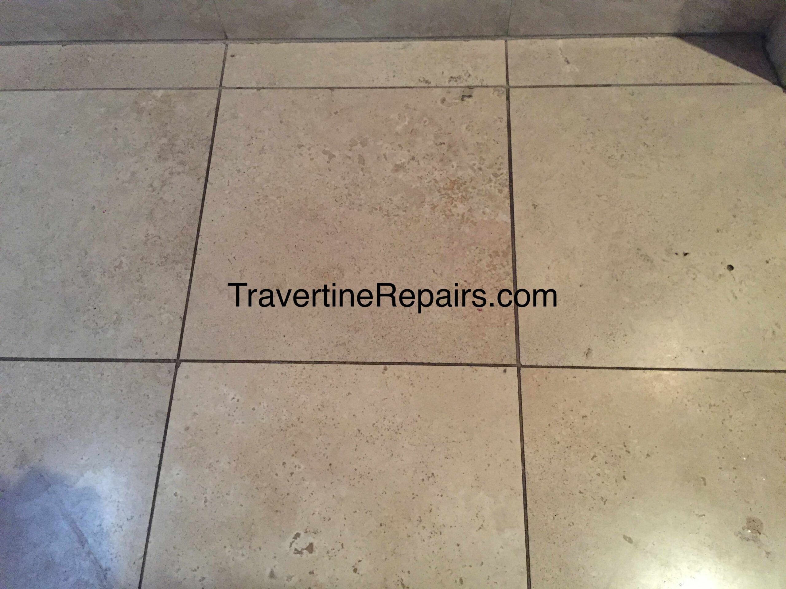 Tile Hole Before Repair